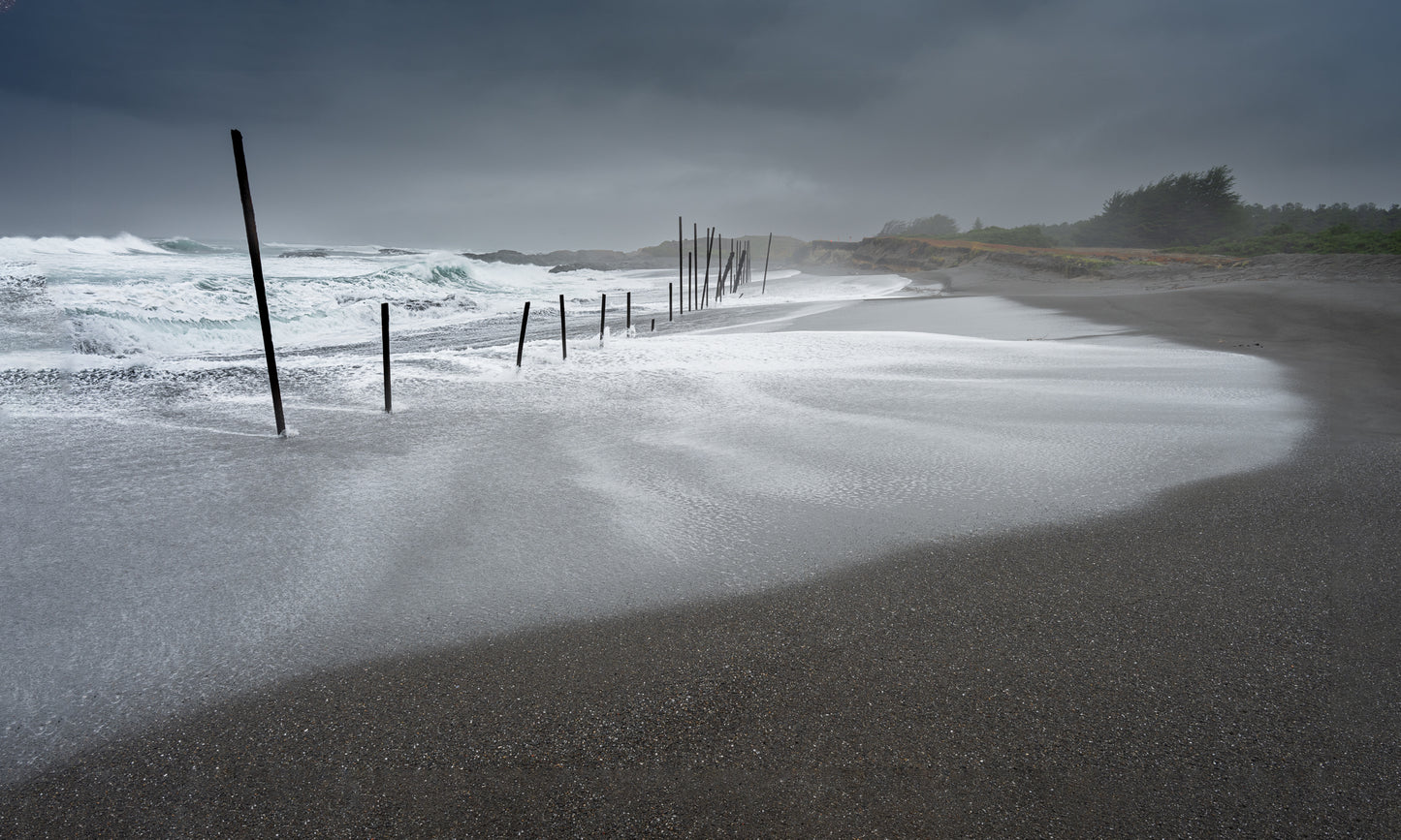 MacKerricher Beach winter storm, sweeping wave rolling up the long beach.